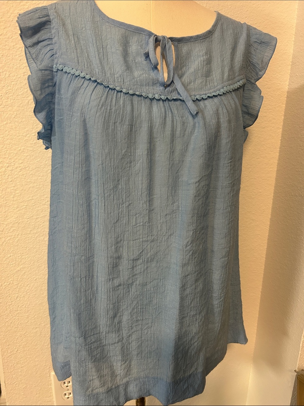 Counterparts Light Blue Ruffle Sleeve Women's Top.